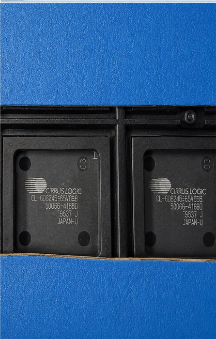 A close-up shot of a black Circus Logic CL-GD6245-65VC-B integrated circuit chip in a black carrier package, with white printed text and a blue surface visible around it.