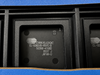 A close-up shot of a black Circus Logic CL-GD6245-65VC-B integrated circuit chip in a black carrier package, with white printed text and a blue surface visible around it.