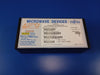 FLC057WG microwave device packaging on a blue background